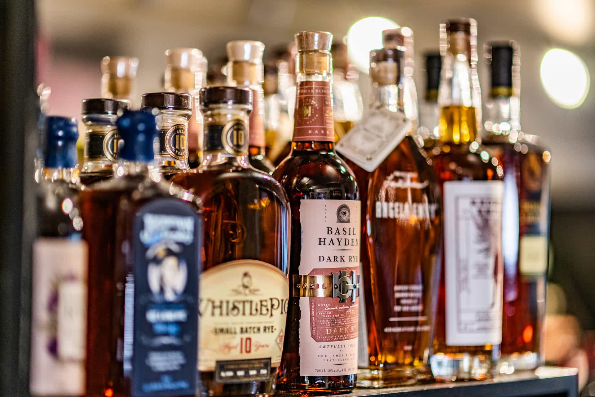 A collection of bottles of spirits.